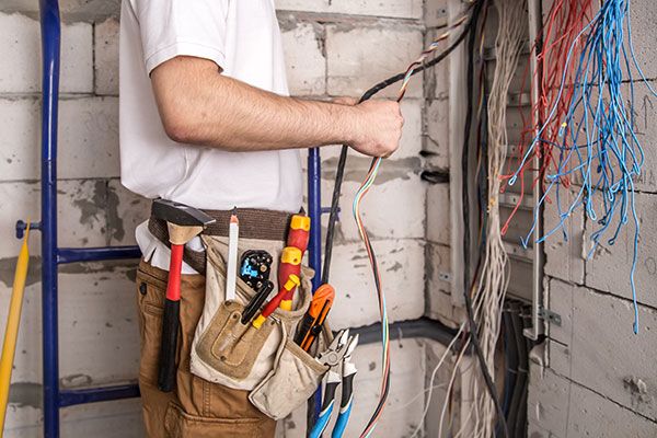 electrician organizing wires