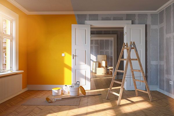 room being painted yellow